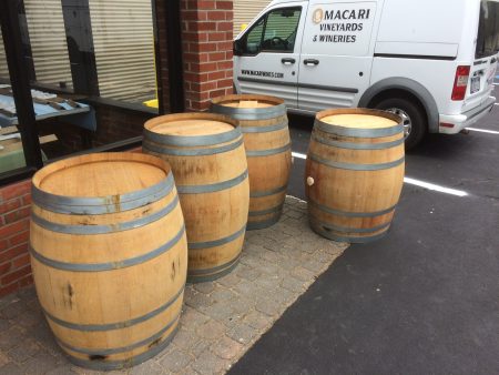 Empty wine barrels for use as tables in the brewery