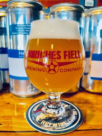 A glass of Moriches Field Brewing Company's Belgian Trickster